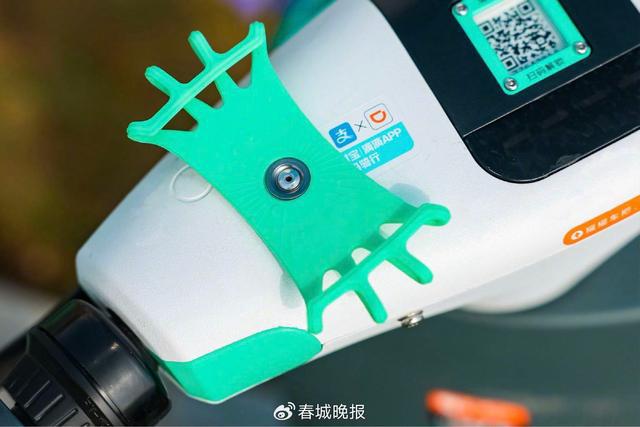 手机支架”再升级提升昆明用户骑游体验AYX爱游戏APP滴滴青桔电单车“(图3)